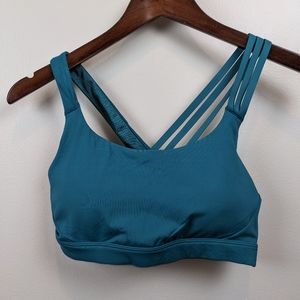 Athleta Teal Criss Cross Sports Bra, size Medium